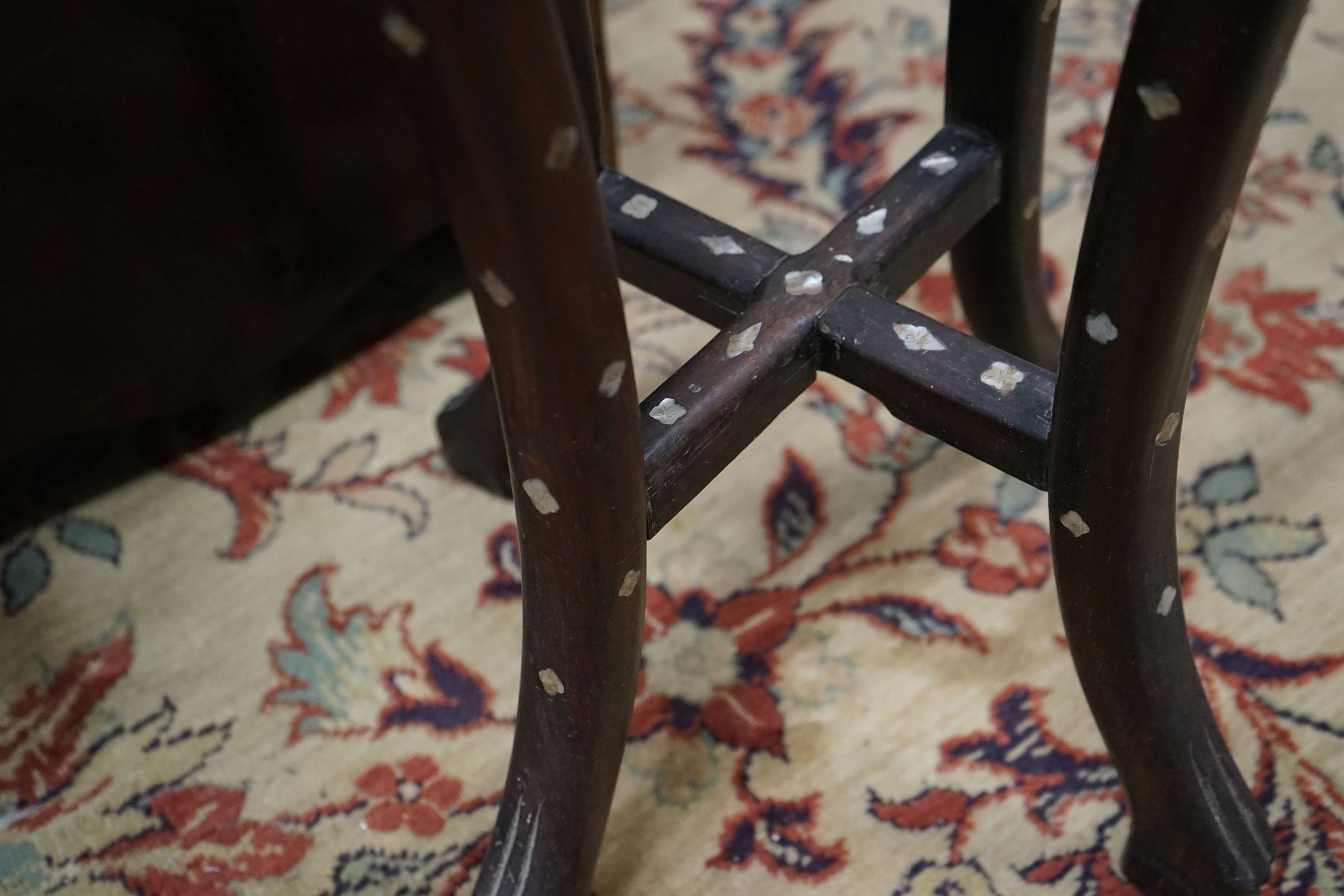 A pair of Chinese mother of pearl inset hardwood vase stands, height 92cm